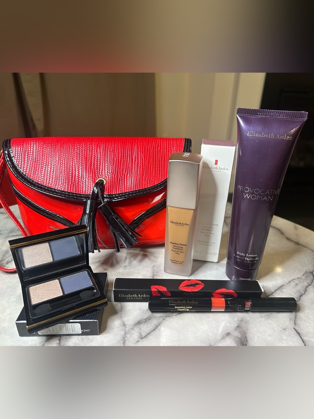 Elizabeth Arden make up, lotion and red bag bundle